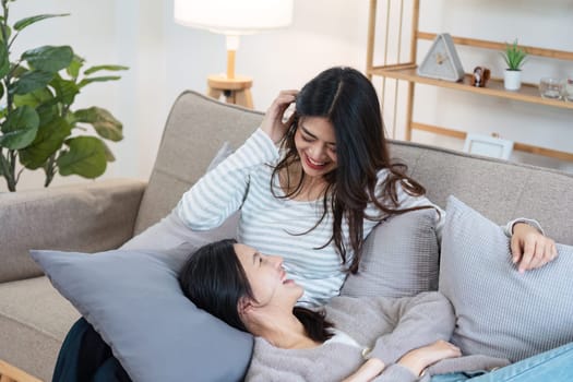 pride month. Happy woman lesbian gay lgbt couple celebrating love together during relax at home. lgbtq couple concept.