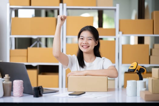 Startup small business entrepreneur SME, asian woman, Portrait of Asian small business owner holding package parcel box isolated on white background, delivery online sell marketing SME concept.