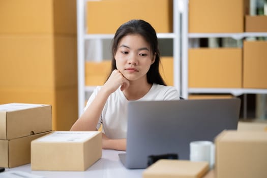 Startup small business entrepreneur SME, asian woman, Portrait of Asian small business owner holding package parcel box isolated on white background, delivery online sell marketing SME concept.