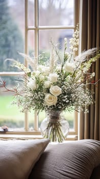 Beautiful floral arrangement with winter, autumn or early spring botanical plants and flowers