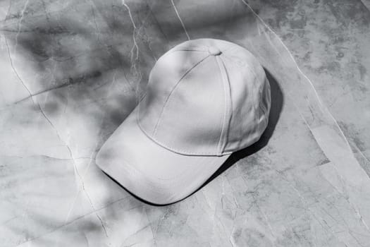 Baseball cap on gray background studio shot close up