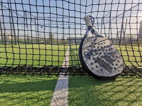 Ukraine Kyiv, April 11 2024. Paddle tennis racket adidas and ball. High quality photo