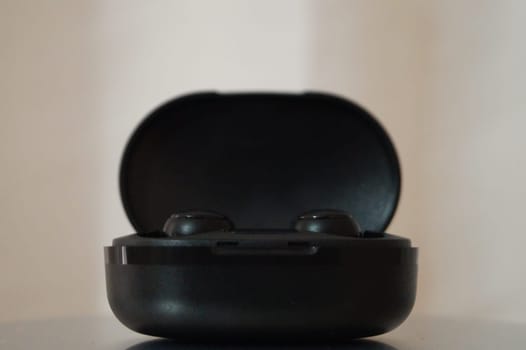 Black Wireless Earbuds. High quality photo