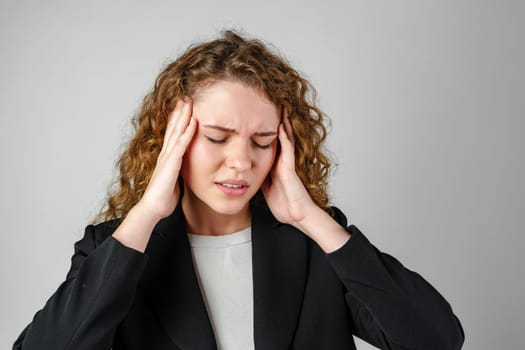 Young Woman With Curly Hair Expressing Concern Upset Sad