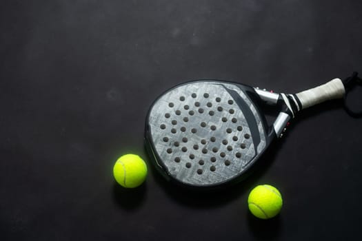 ball racket paddel black background. High quality photo