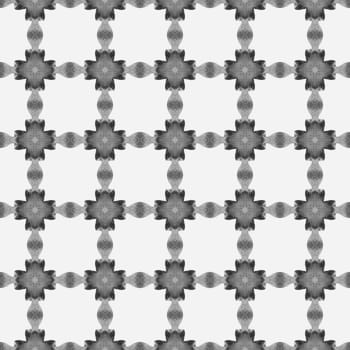 Hand drawn tropical seamless border. Black and white neat boho chic summer design. Tropical seamless pattern. Textile ready eminent print, swimwear fabric, wallpaper, wrapping.
