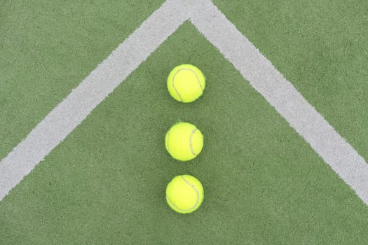 Tennis ball on green grass. High quality photo