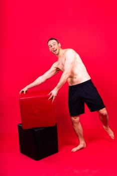 Portrait of man, bodybuilder and bicep flex in a studio, background and exercise for muscular power.