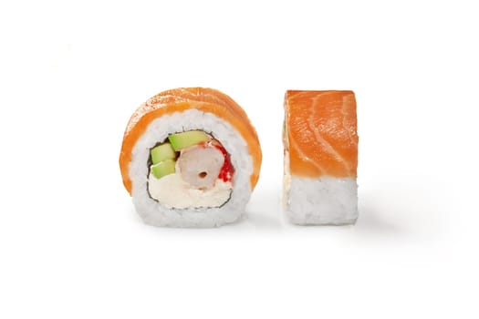 Single salmon-wrapped sushi roll filled with succulent shrimp, cream cheese, tobiko and soft avocado, displayed isolated on white background. Japanese fusion cuisine