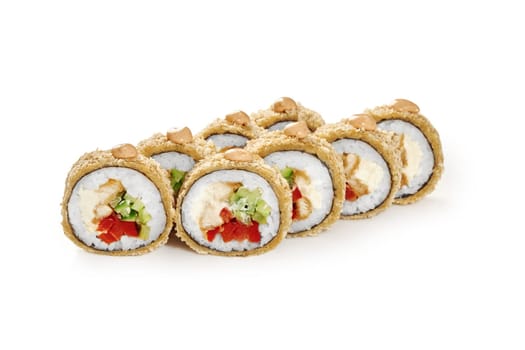 Appetizing warm tempura roll with fried chicken, cream cheese, cucumber and bell pepper in crispy panko breadcrumbs seasoned with spicy mayo on white background. Japanese cuisine