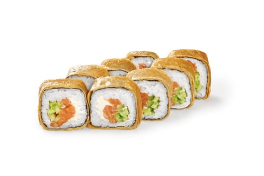 Delicious crepe sushi roll filled with salmon, fresh cucumber and cream cheese, closeup view isolated on white background. Japanese style cuisine