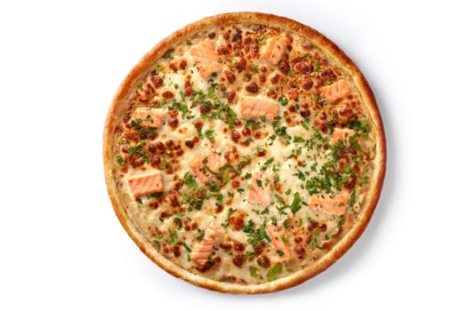 Top view of appetizing Italian seafood pizza with browned edges, slices of salmon on cream sauce garnished with fresh greens, presented isolated on white background