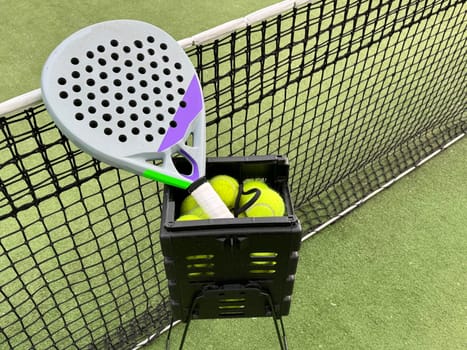 padel tennis racket sport court and balls. High quality photo