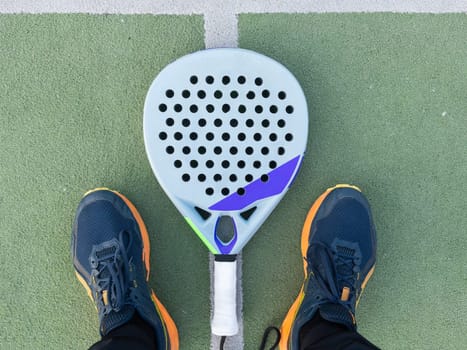 Paddle tennis racket and ball. High quality photo