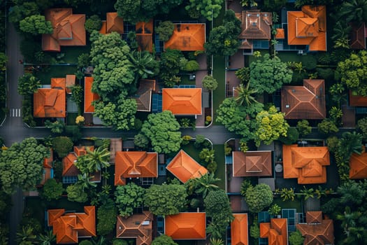 An aerial perspective of a house located amidst a cluster of trees.