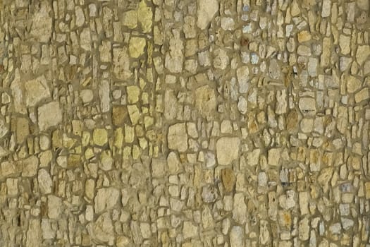A detailed close up view of a textured stone wall showcasing its unique patterns and rough surface.