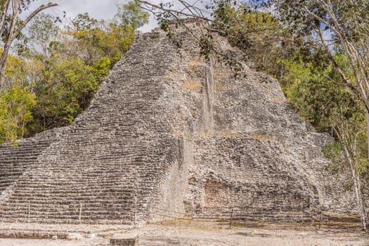 Coba, Mexico. Ancient mayan city in Mexico. Coba is an archaeological area and a famous landmark of Yucatan Peninsula. Cloudy sky over a pyramid in Mexico.