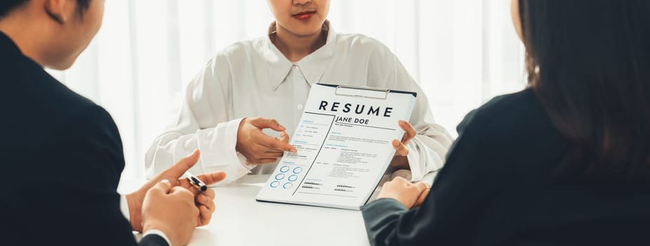 Corporate recruiter interview job applicant to discuss career goal and assess resume and experience. Job interview appointment for career opportunity and HR manager concept. Panorama Shrewd