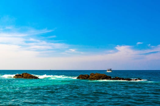 Seascape landscape and tropical nature panorama view on blue whale boat trip catamaran tour in Mirissa Beach Matara District Southern Province Sri Lanka.