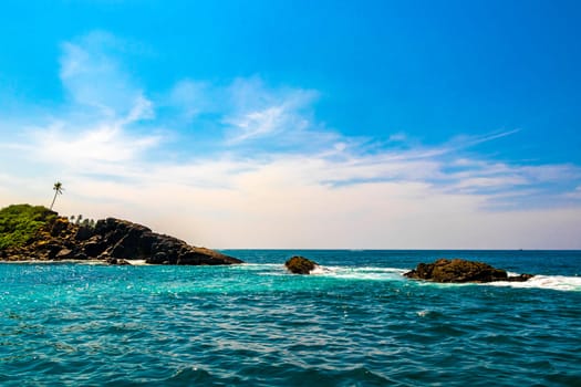 Seascape landscape and tropical nature panorama view on blue whale boat trip catamaran tour in Mirissa Beach Matara District Southern Province Sri Lanka.