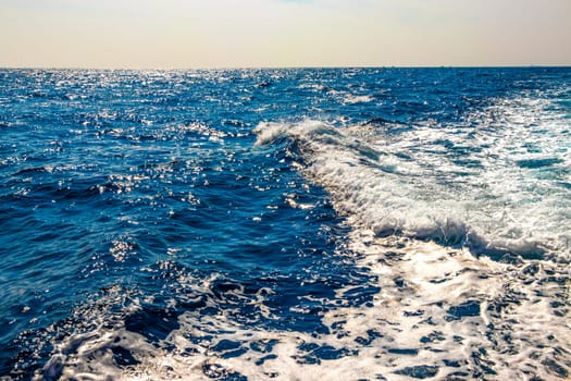 Seascape ocean water and waves on blue whale boat trip catamaran tour in Mirissa Beach Matara District Southern Province Sri Lanka.