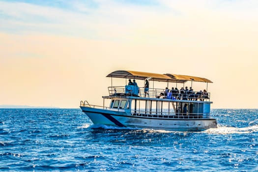 Mirissa Beach Southern Province Sri Lanka 19. March 2018 Boat trip catamaran ship tour blue whale tourists people and sea ocean and water in Mirissa Beach Matara District Southern Province Sri Lanka.