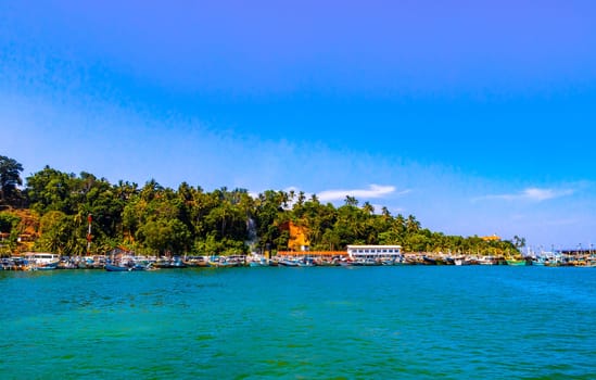 Mirissa Beach Southern Province Sri Lanka 19. March 2018 Mirissa Fisheries Harbor with boat boats ships catamaran to blue whale tour in Mirissa Beach Matara District Southern Province Sri Lanka.