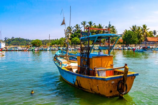 Mirissa Beach Southern Province Sri Lanka 19. March 2018 Mirissa Fisheries Harbor with boat boats ships catamaran to blue whale tour in Mirissa Beach Matara District Southern Province Sri Lanka.