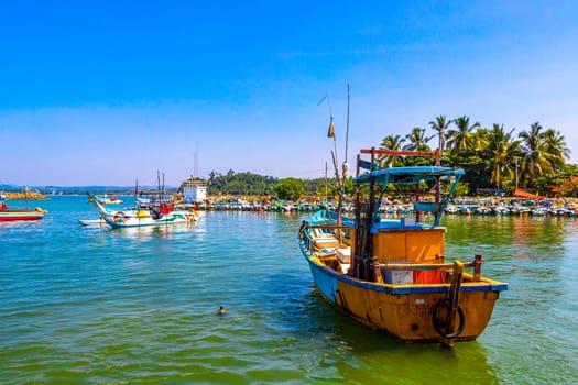 Mirissa Beach Southern Province Sri Lanka 19. March 2018 Mirissa Fisheries Harbor with boat boats ships catamaran to blue whale tour in Mirissa Beach Matara District Southern Province Sri Lanka.