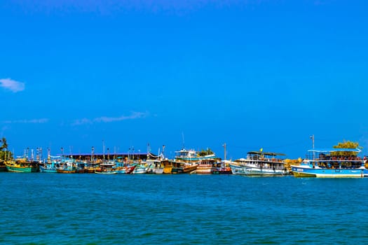 Mirissa Beach Southern Province Sri Lanka 19. March 2018 Mirissa Fisheries Harbor with boat boats ships catamaran to blue whale tour in Mirissa Beach Matara District Southern Province Sri Lanka.