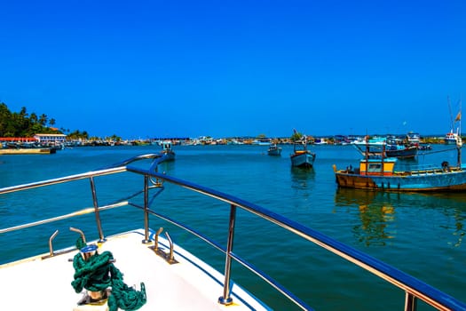 Mirissa Beach Southern Province Sri Lanka 19. March 2018 Mirissa Fisheries Harbor with boat boats ships catamaran to blue whale tour in Mirissa Beach Matara District Southern Province Sri Lanka.