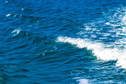 Seascape ocean water and waves on blue whale boat trip catamaran tour in Mirissa Beach Matara District Southern Province Sri Lanka.