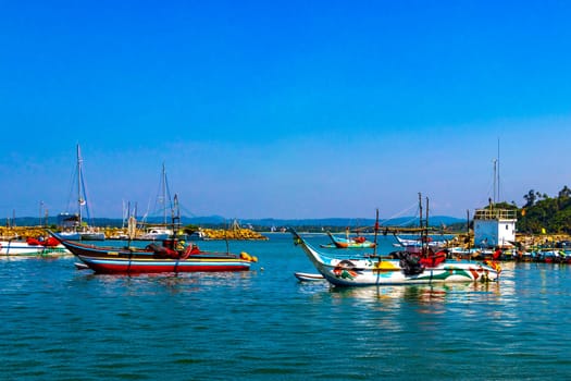 Mirissa Beach Southern Province Sri Lanka 19. March 2018 Mirissa Fisheries Harbor with boat boats ships catamaran to blue whale tour in Mirissa Beach Matara District Southern Province Sri Lanka.