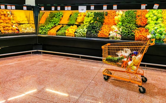 Supermarket from the inside Shelves Goods People Shopping carts Products Aisles in Playa del Carmen Quintana Roo Mexico.