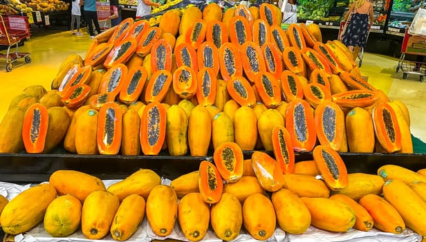 Wrapped packaged sliced papaya fruit in Playa del Carmen Quintana Roo Mexico.