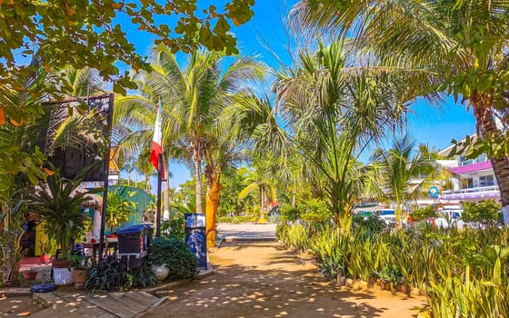 Restaurant restaurants bar bars shops hotels palms palm trees and promenades on the beach in Zicatela Puerto Escondido Oaxaca Mexico.