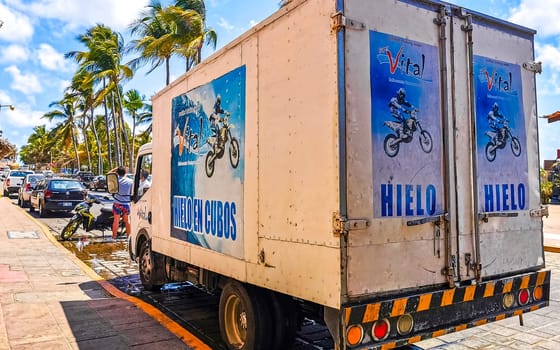 Various Mexican trucks cargo transporter delivery cars in Puerto Escondido zicatela Oaxaca Mexico.
