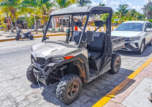 Quad bike bikes atv scooters motorcycles motorbikes outdoor in Zicatela Puerto Escondido Oaxaca Mexico.