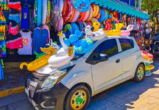 White silver gray grey car vehicle transportation in the city town in Zicatela Puerto Escondido Oaxaca Mexico.