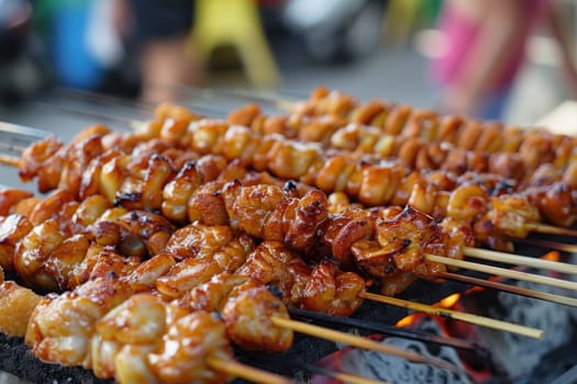 Delectable Thai street food featuring succulent meat skewers.