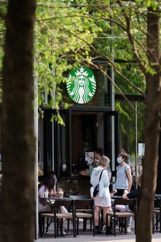 Taipei - May 01 2024 : Starbucks coffee shop in Breeze Nan Shan shopping mall near Taipei 101.