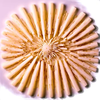 Jicama Stick Mandala crisp white jicama sticks radiating outward in a striking circular pattern edges. Food isolated on transparent background.