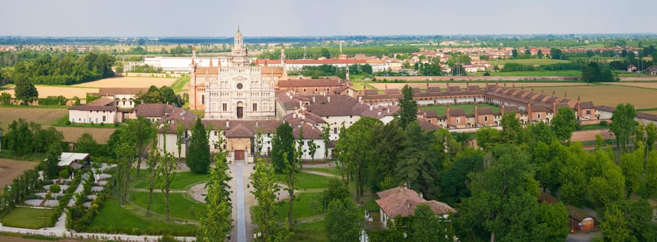 Aerial shot of Certosa di Pavia cathedral a historical monumental complex that includes a monastery and a sanctuary. Pavia ,Italy.