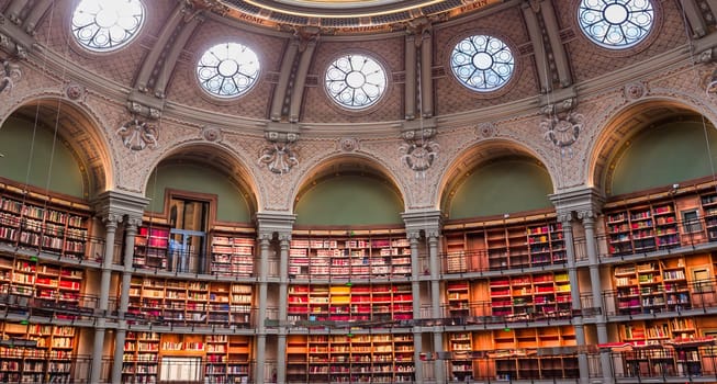 PARIS, FRANCE, OCTOBER 20, 2022 : Oval reading room in National Library, Richelieu site, Paris, france, built by architects Jean-Louis Pascal. and Alfred Recoura, from year 1897 to year 1932