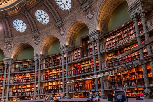 PARIS, FRANCE, OCTOBER 20, 2022 : Oval reading room in National Library, Richelieu site, Paris, france, built by architects Jean-Louis Pascal. and Alfred Recoura, from year 1897 to year 1932