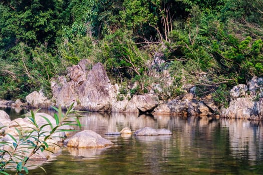 Central Vietnam. Rocks mountains river. Reflections in water. Magic nature energy Fresh Freedom Calm.