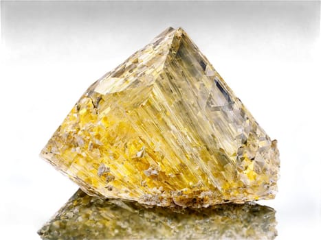 Stone isolated on transparent background. Orthoclase A pale yellow orthoclase feldspar with a sharp glassy finish captured in mid air.