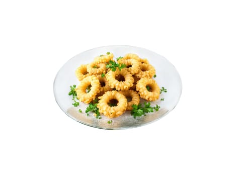 Tapas fried calamari rings with lemon and parsley served on a transparent glass plate crispy. Food isolated on transparent background.