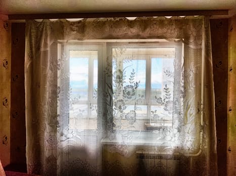 Morning Light Filtering Through Lace Curtains in a Cozy Room. Chiffon curtain on the window in the room