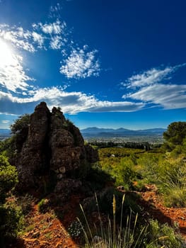 The sun shines brightly over a rocky outcropping, Spain nature, Spanish mountains. High quality photo